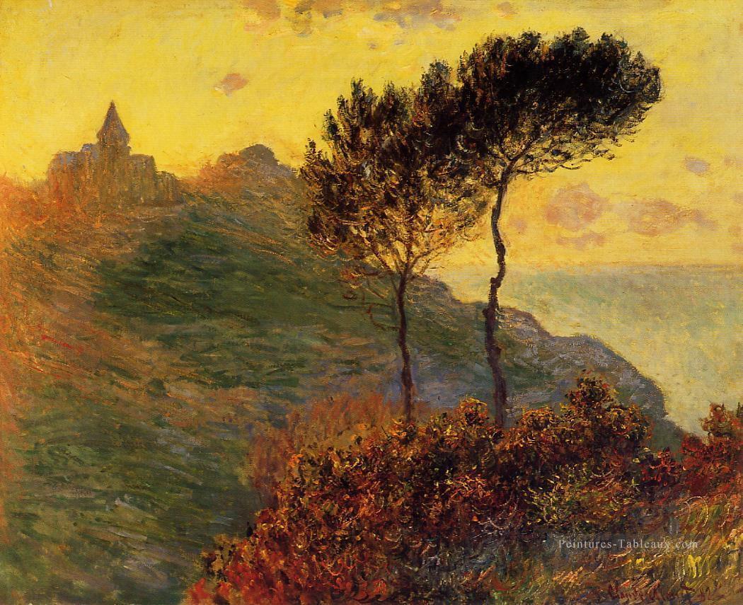 L’église de Varengeville contre le paysage coucher de soleil Claude Monet Peintures à l'huile